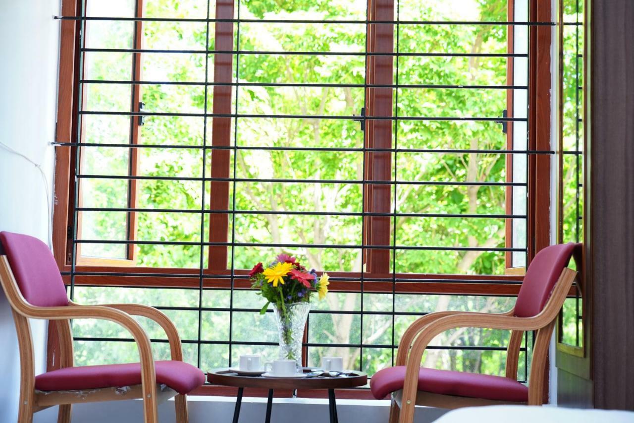 Unnathi Suites Mysore Εξωτερικό φωτογραφία